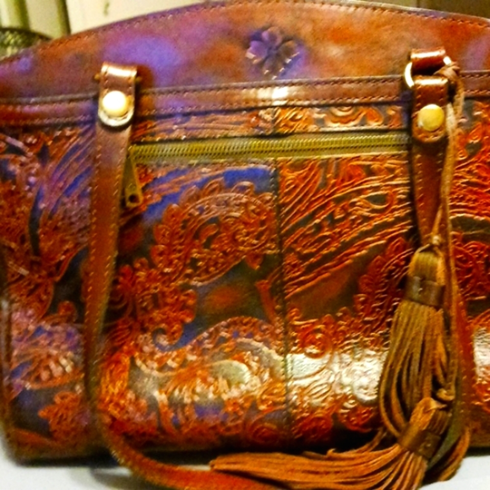 Patrica Nash paisley handbag. The bag is brown, has 3 large compartments.